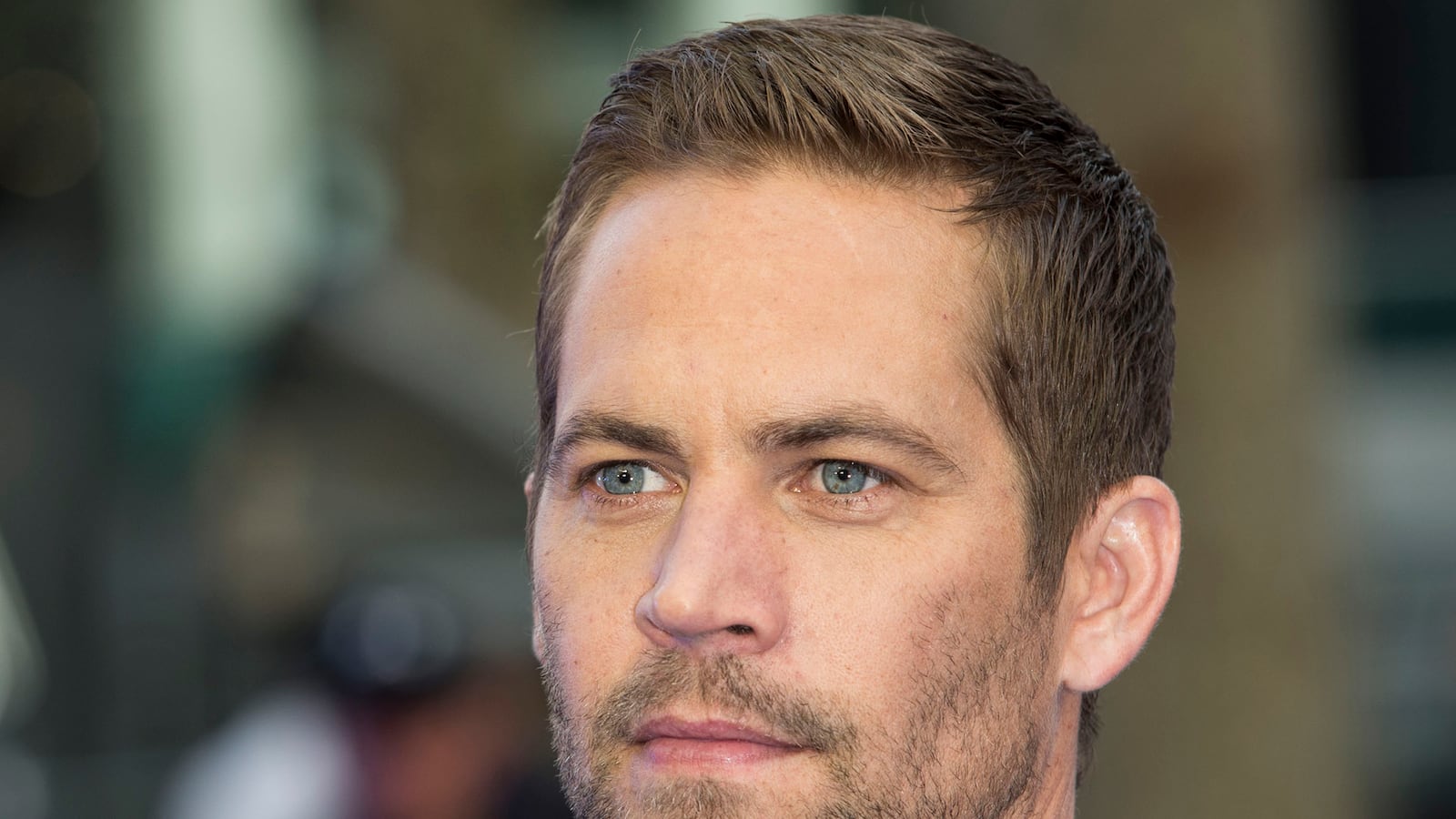 articles/2013/11/30/actor-paul-walker-star-of-the-fast-and-the-furious-films-dies-in-car-crash/131130-stern-walker-tease_x23n5z