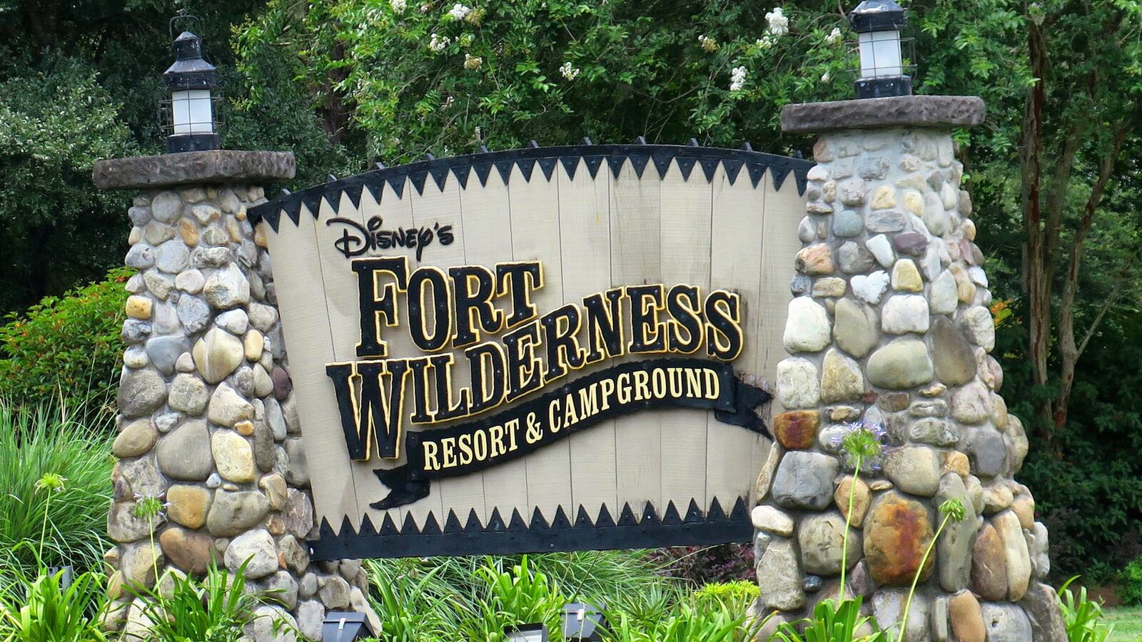 A view of the entrance signage at Disney's Fort Wilderness Resort & Campground, at Walt Disney World in Lake Buena Vista, Fla., Monday, June 22, 2020. Fort Wilderness opened Monday as a part of select resorts in the first group to reopen since being shutdown by the coronavirus pandemic in March. Other properties that opened Monday include The Villas at the Grand Floridian, Bay Lake Tower at Disney's Contemporary Resort, Boulder Ridge Villas and the Copper Creek Villas & Cabins at Wilderness Lodge, Kidani at Disney's Animal Kingdom Villas; the Beach Club Villas, the BoardWalk Villas, Old Key West, Polynesian Villas & Bungalows, Disney's Riviera Resort, and Saratoga Springs. (Joe Burbank/Orlando Sentinel/Tribune News Service via Getty Images)