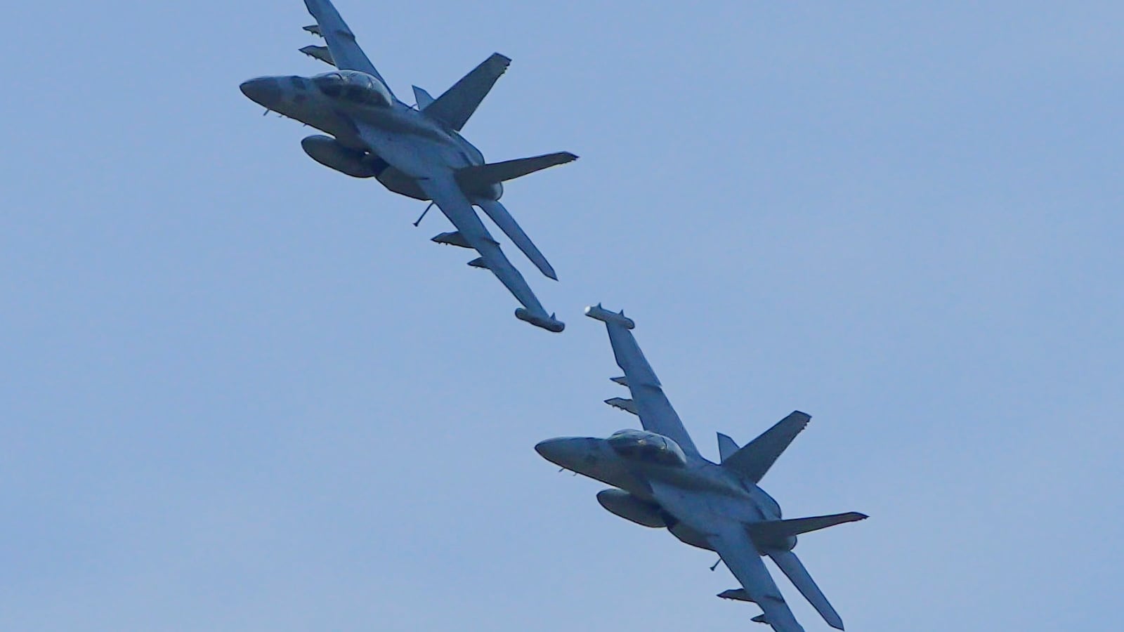 U.S. Navy E/A-18G Growler aircrafts make an aerial demonstration during the 2023 Abbotsford International Airshow in Abbotsford, British Columbia, Canada, on Aug. 12, 2023.