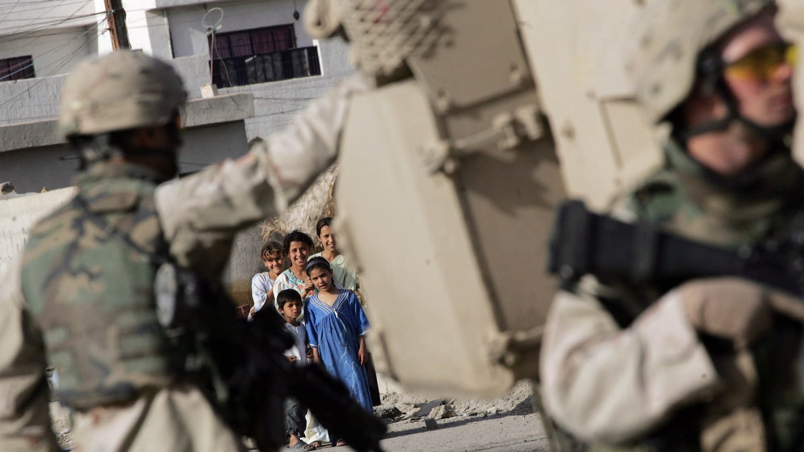 articles/2013/03/19/america-s-lost-decade-in-iraq-a-marine-officer-looks-back/130318-Busch-Iraq-War-tease_vuvh6n