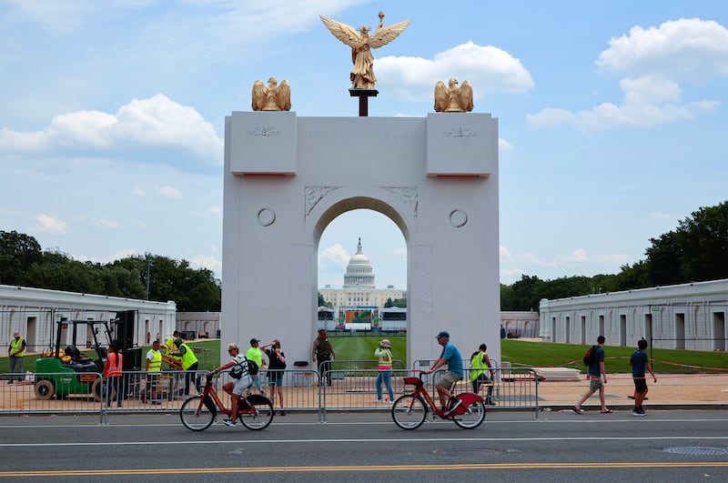 A scale replica of President Donald Trump's 250-foot-tall "Triumphal Arch" stands in the middle of the National Mall along 7th Street Northwest on June 22, 2026 in Washington, DC. The display is part of Trump's Freedom 250 Great American State Fair, which will fill the mall with 150 exhibits from all 56 states and territories from June 25 to July 10.