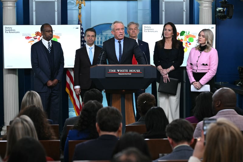 Secretary of Health and Human Services Robert F. Kennedy Jr. speaks during the daily briefing in the Brady Briefing Room of the White House in Washington, DC, on January 7, 2026. Also pictured, L/R, retired neurosurgeon Ben Carson, FDA Commissioner Marty Makary, Medicare and Medicaid Administrator Mehmet Oz, Secretary of Agriculture Brooke Rollins, and White House Press Secretary Karoline Leavitt. (Photo by Mandel NGAN / AFP via Getty Images)
