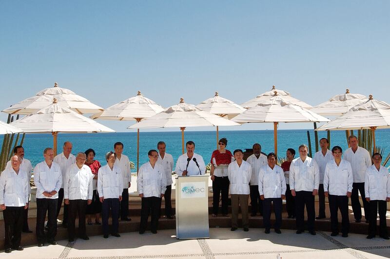 galleries/2011/11/15/apec-silly-shirts-through-the-years-photos/apec-silly-shirts-2002_gsmhzu