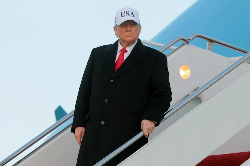 JOINT BASE ANDREWS, MARYLAND - JANUARY 13: U.S. President Donald Trump walks down the air stairs after landing on Air Force One on January 13, 2026 at Joint Base Andrews, Maryland. Trump spent the day in Detroit participating in a tour of the Ford River Rouge complex and speaking at the Detroit Economic Club.  (Photo by Anna Moneymaker/Getty Images)