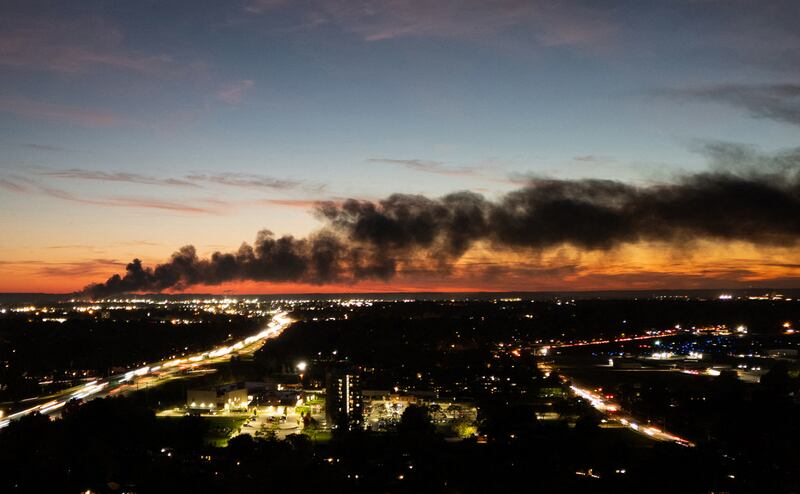 Smoke rises from the site of a UPS cargo plane crash near the UPS Worldport at Louisville Muhammad Ali International Airport in Louisville, Kentucky, on November 4, 2025.