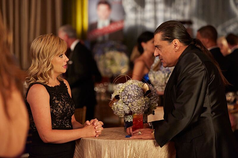 Amy Poehler as Leslie Knope and Jonathan Joss as Ken Hotate in Parks and Recreation.