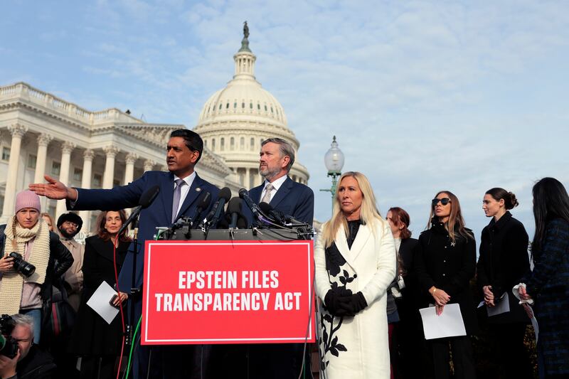 Rep. Marjorie Taylor Greene along with Reps. Ro Khanna and Rep. Thomas Massie who pushed for the discharge petition to force a vote on the Epstein Files Transparency Act.