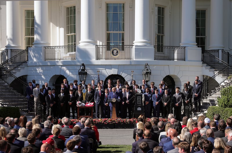 WASHINGTON, DC - MAY 11: U.S. President Donald Trump delivers remarks as he welcomes the 2026 NCAA football national champion Indiana Hoosier and their head coach Curt Cignetti during an event on the South Lawn of the White House on May 11, 2026 in Washington, DC. The Indiana Hoosiers defeated the Miami Hurricanes 27-21 to win their first-ever College Football Playoff National Championship on January 19, 2026. on May 11, 2026 in Washington, DC. (Photo by Kevin Dietsch/Getty Images)