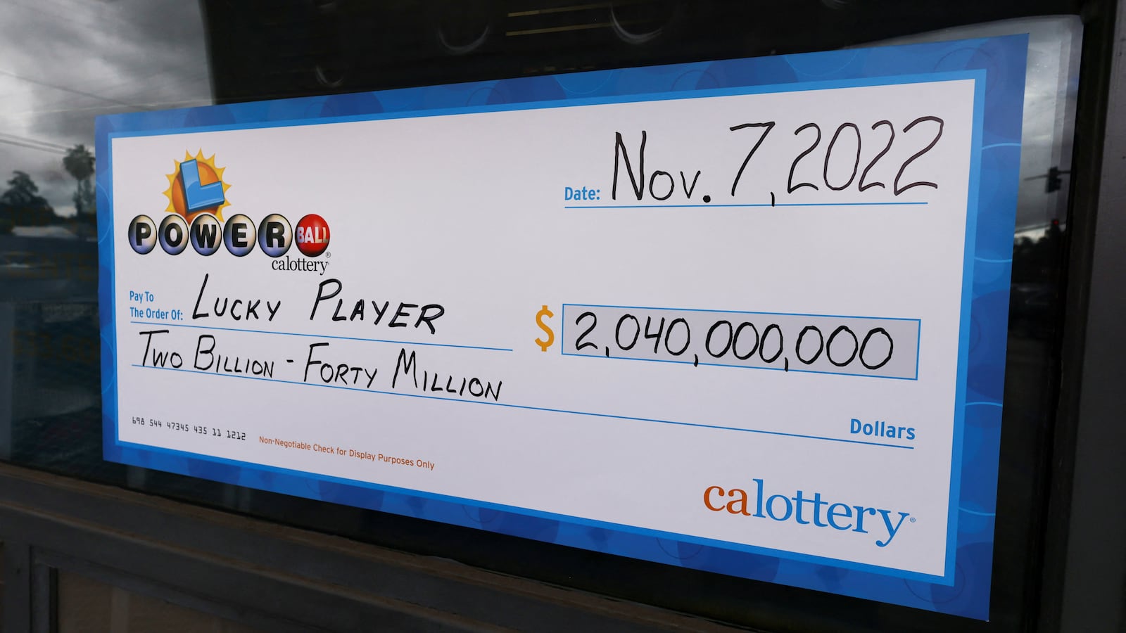 A display check is seen at Joe’s Service Center, where a single winning ticket for the Powerball lottery drawing was sold, in Altadena, California