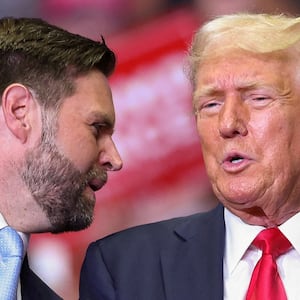 Donald Trump stands with JD Vance as he holds a rally for the first time with his running mate, in Grand Rapids, Michigan, U.S. July 20, 2024.