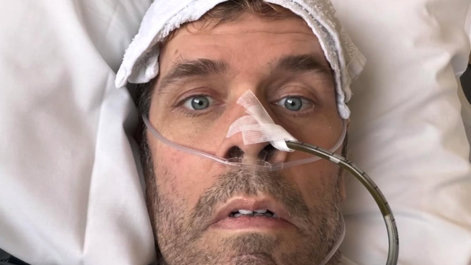 Perez Hilton in a hospital bed.