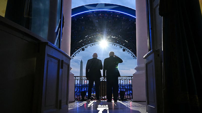 US President Donald Trump and UFC CEO Dana White stand on the Blue Room Balcony of the White House at the start of the "UFC Freedom 250" mixed martial arts event in Washington, DC, June 14, 2026.     SAUL LOEB/Pool via REUTERS