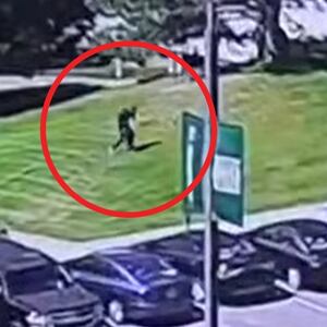 FBI release footage of Charlie Kirk's suspected killer fleeing the scene.