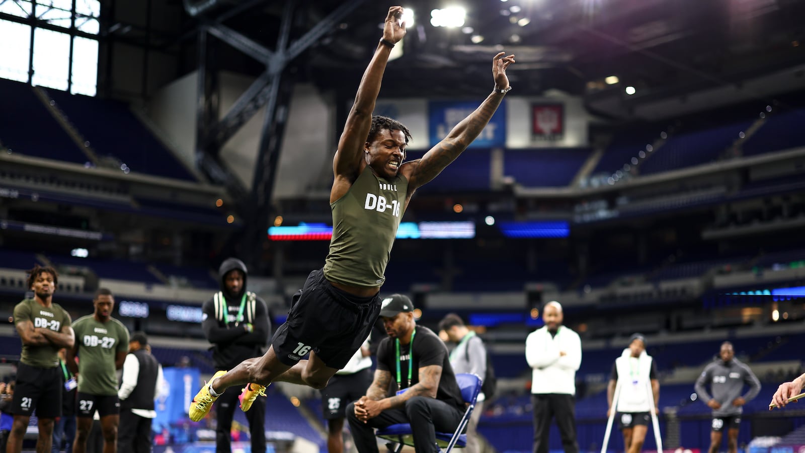 Khyree Jackson participates in the broad jump during the NFL Combine
