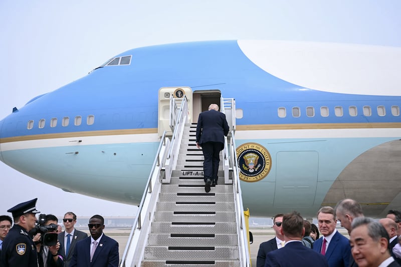 US President Donald Trump boards Air Force One before his departure from Beijing Capital Airport in Beijing on May 15, 2026.