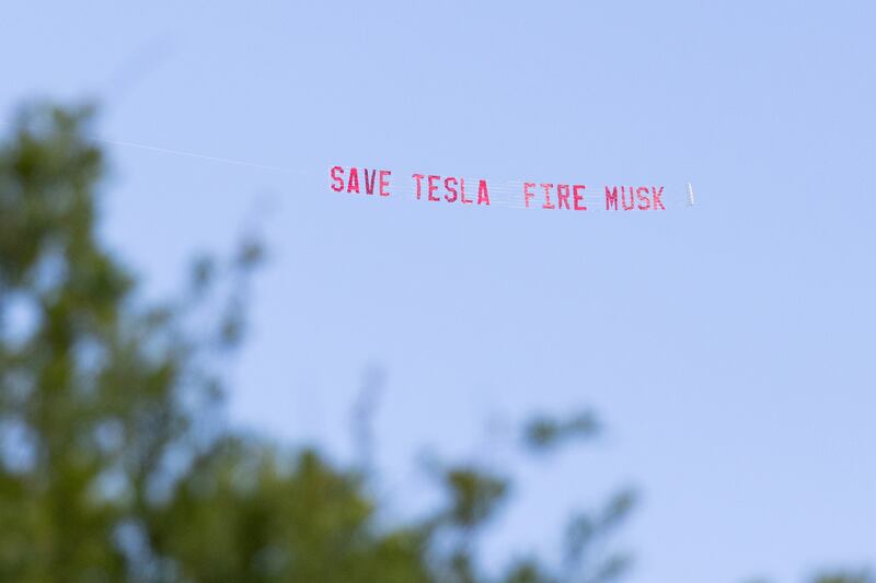 A banner reading "Save Tesla, Fire Musk" was flown over the state capital building in Austin, Texas, on June 22. Tesla operates a large manufacturing facility—called Gigafactory Texas—in Austin, and Musk has spent significant time in the state since his MAGA breakup.