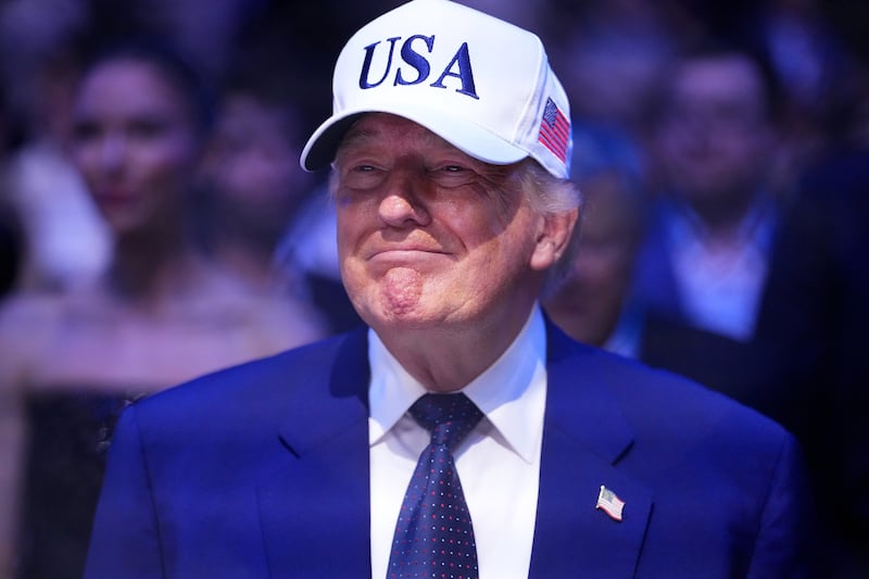 U.S. President Donald J. Trump watches the UFC lightweight championship fight during the UFC Freedom 250 event on the South Lawn at the White House on June 14, 2026 in Washington, DC.