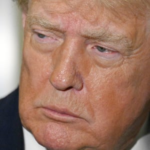 President Donald Trump speaks to reporters.