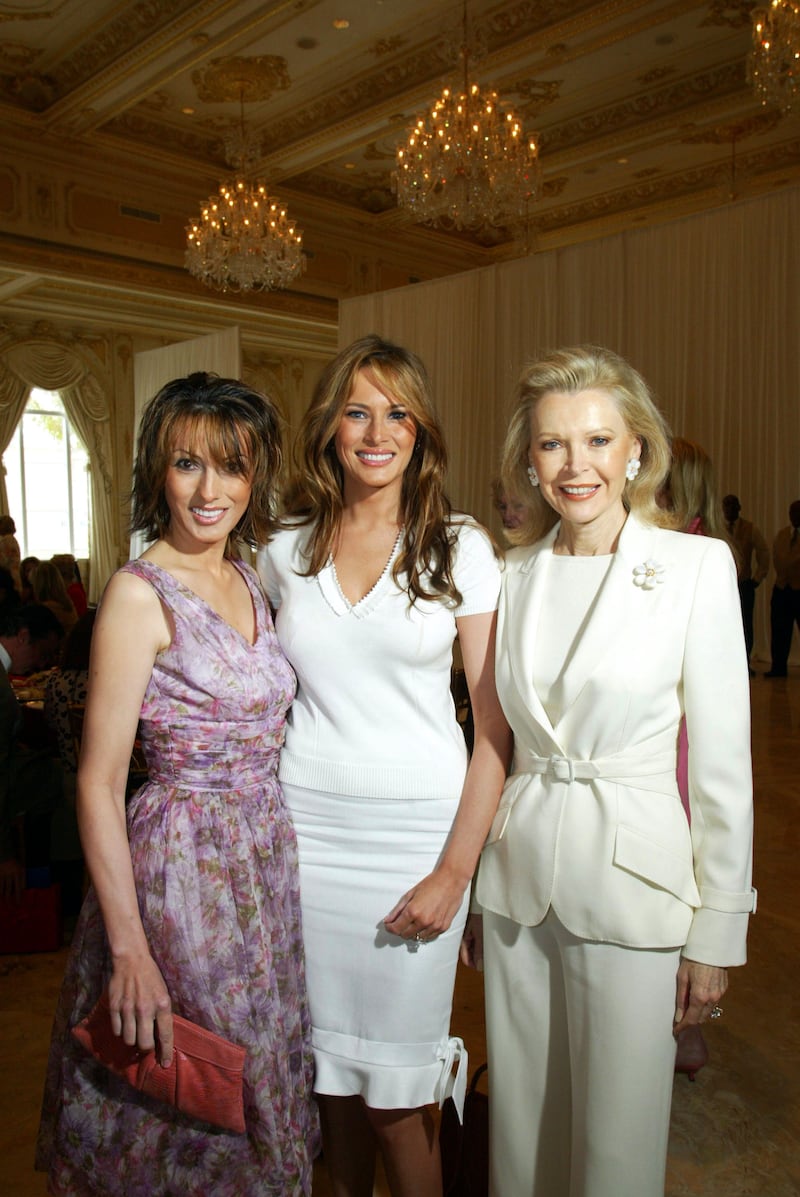 Ines Knauss (L) and Melania Trump (center).