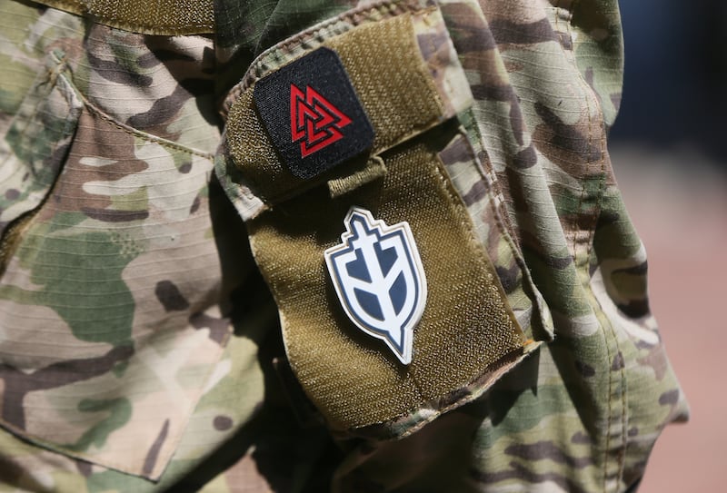 A chevron of Russian Volunteer Corps (RVC) is seen during a donating blood campaign for the Armed Forces of Ukraine in Kyiv, Ukraine, on 3 June 2023, amid Russia's invasion of Ukraine. NGO ''Movement of Change'' in partnership with the Russian Volunteer Corps (RVC) hold a campaign of collection of blood for the needs of the Armed Forces of the Armed Forces of Ukraine. Since the beginning of Russia's full-scale invasion of Ukraine, on February 24, 2022, in a video message, President Volodymyr Zelensky appealed to Ukrainians to donate blood for transfusions to wounded Ukrainian military personnel. (Photo by STR/NurPhoto via Getty Images)