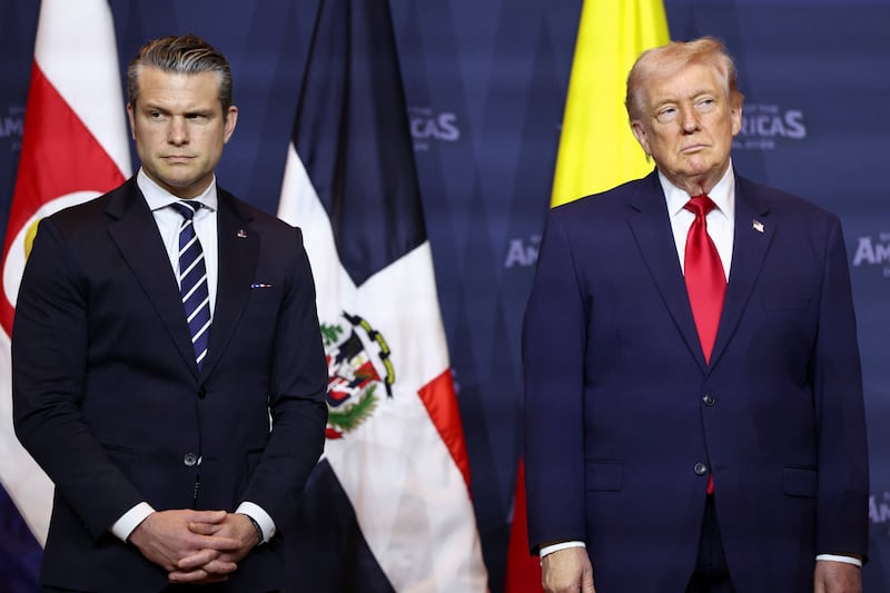 U.S. Secretary of Defense Pete Hegseth and U.S. President Donald Trump attend the "Shield of the Americas" Summit in Miami, Florida, U.S., March 7, 2026.