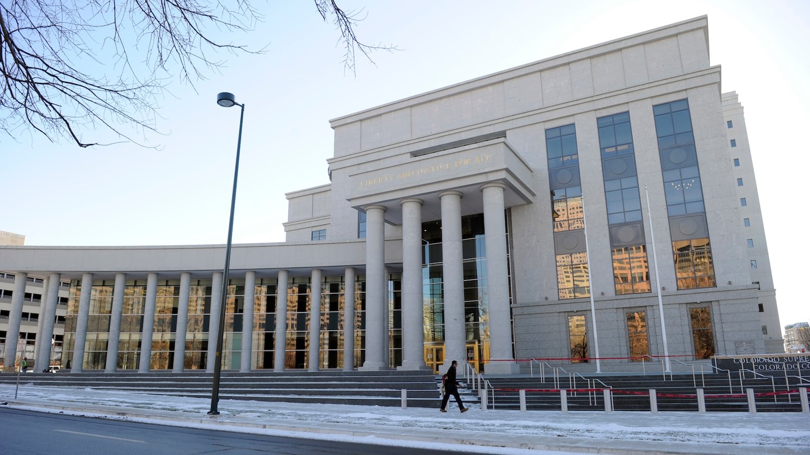 Construction crews put the finishing touches on the new Ralph L. Carr Colorado Judicial Center at 2 East 14th Avenue in Denver