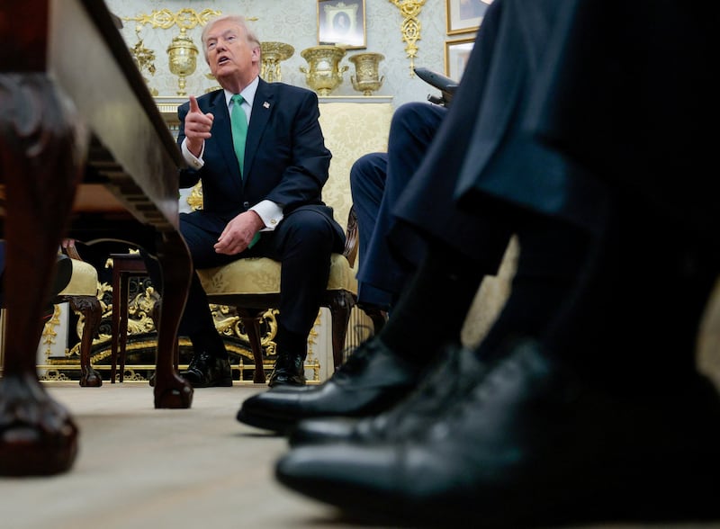 U.S. President Donald Trump speaks during a meeting with Irish Taoiseach (Prime Minister) Micheal Martin at the White House in Washington, D.C., U.S., March 17, 2026. REUTERS/Evan Vucci