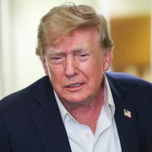 President Donald Trump speaks to reporters aboard Air Force One while traveling back from Ireland to Joint Base Andrews, Maryland on September 13, 2026 in flight.