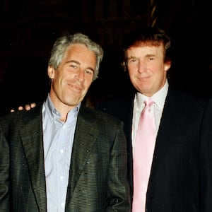 Jeffrey Epstein (left) and Donald Trump as they pose together at the Mar-a-Lago estate, Palm Beach, Florida on February 22, 1997.