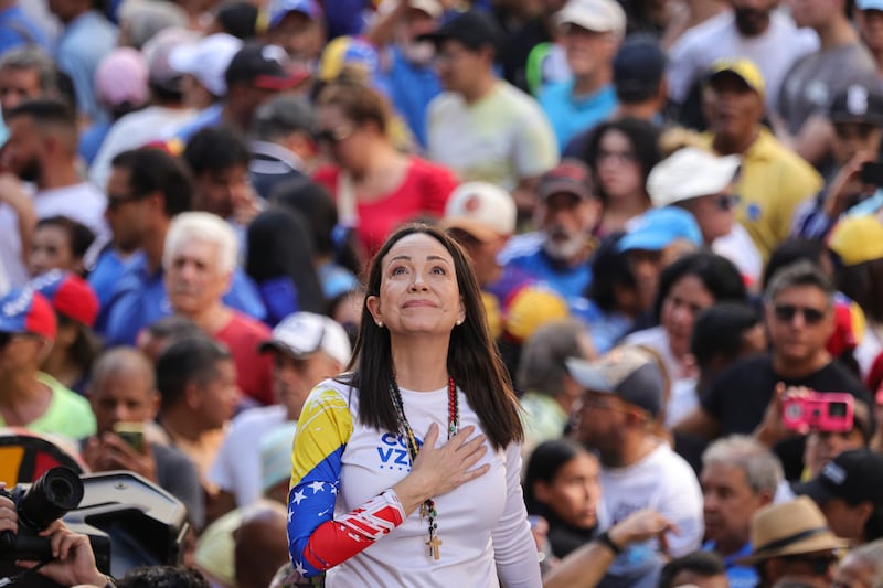 CARACAS, VENEZUELA - JANUARY 9: Opposition leader Maria Corina Machado gestures during an anti-government protest on January 9, 2025 in Caracas, Venezuela. According to information shared by the Vente Venezuela Party, Machado was intercepted by government forces deployed by president Nicolas Maduro after finishing her participation in the rally. (Photo by Jesus Vargas/Getty Images)