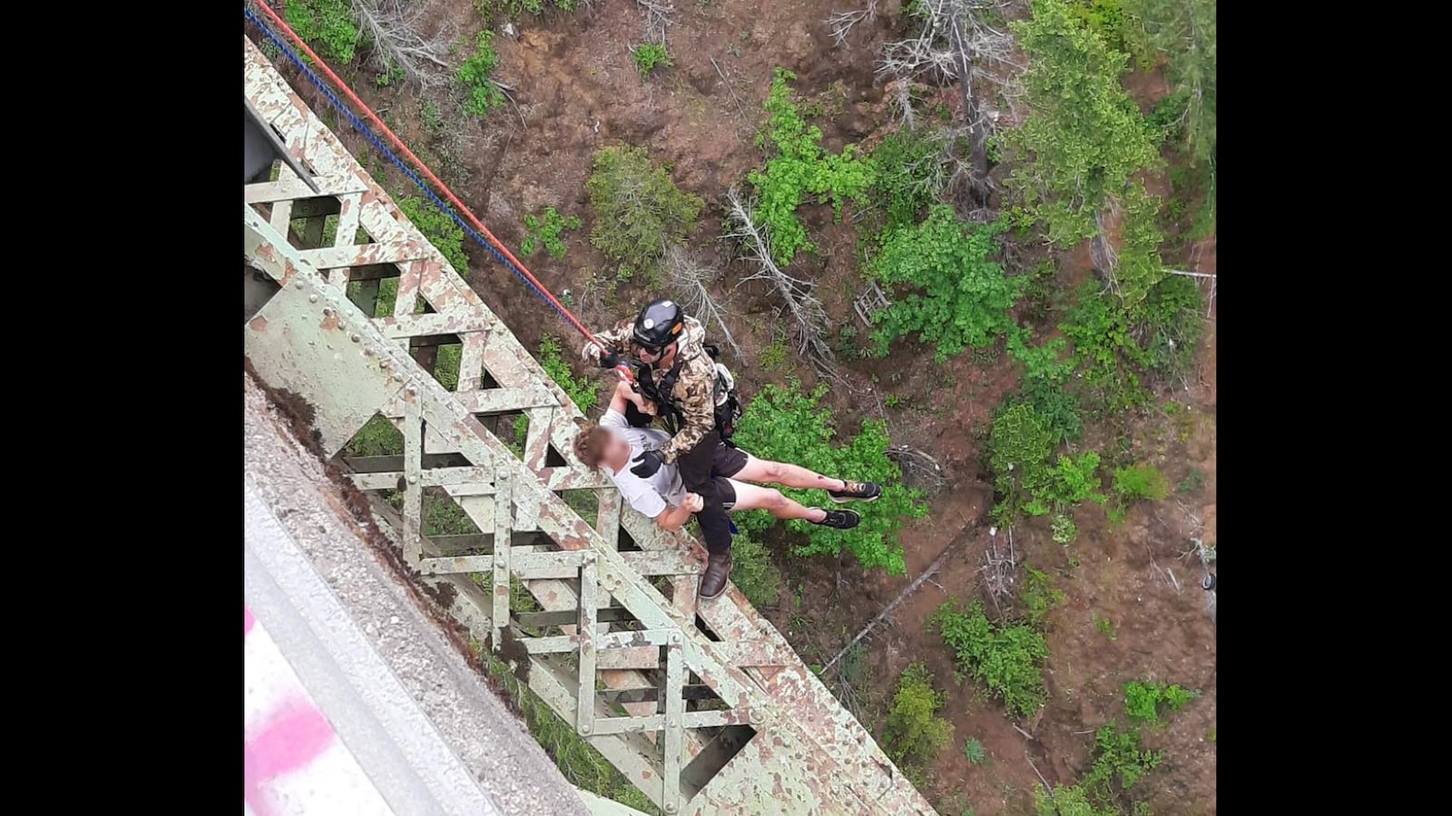 A 19-year-old male had fallen approximately 400 feet down the side of the canyon at the High Steel Bridge.