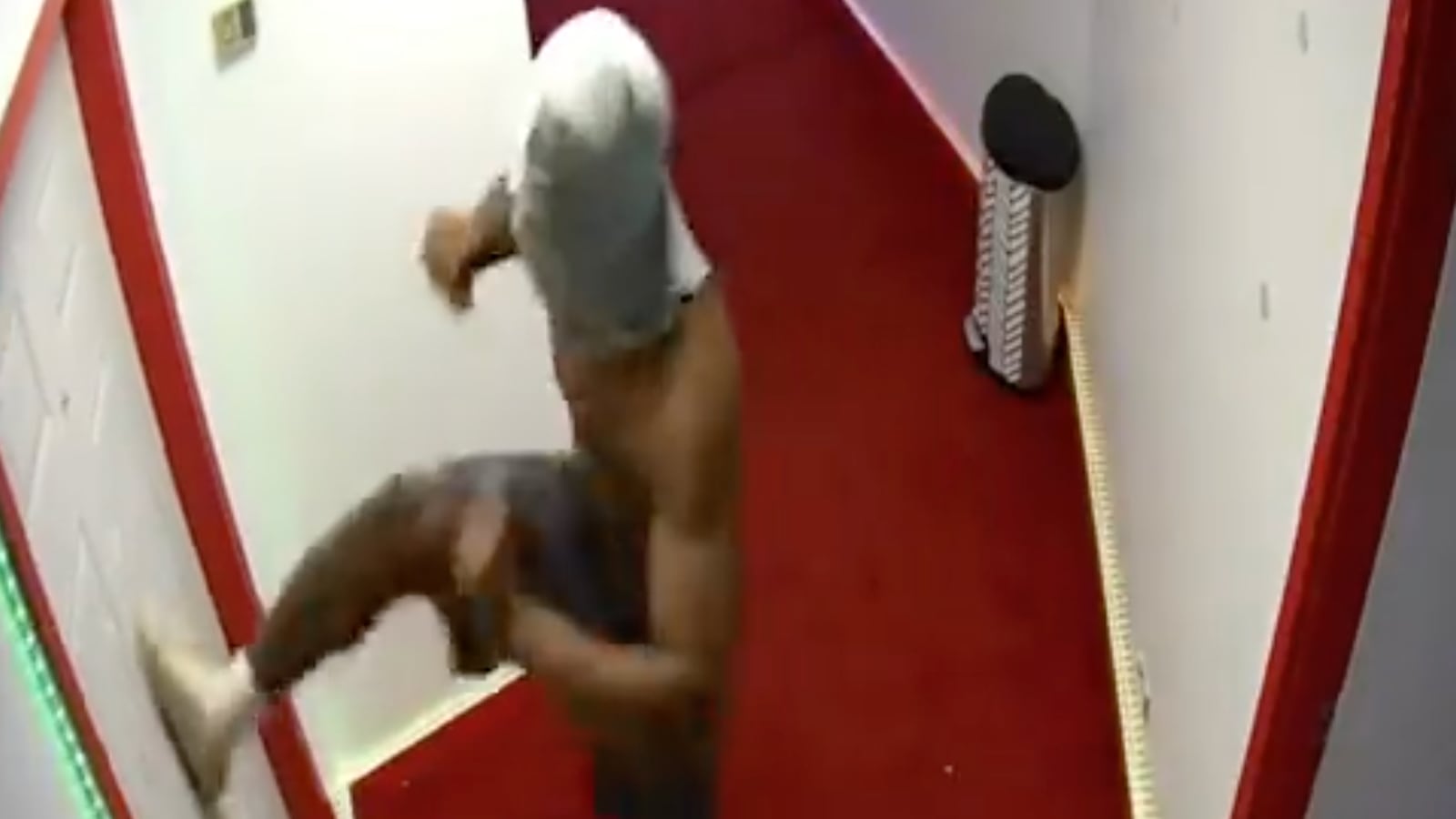 Security camera footage allegedly showing Nebraska TE Arik Gilbert attempting to burglarize a smoke shop.