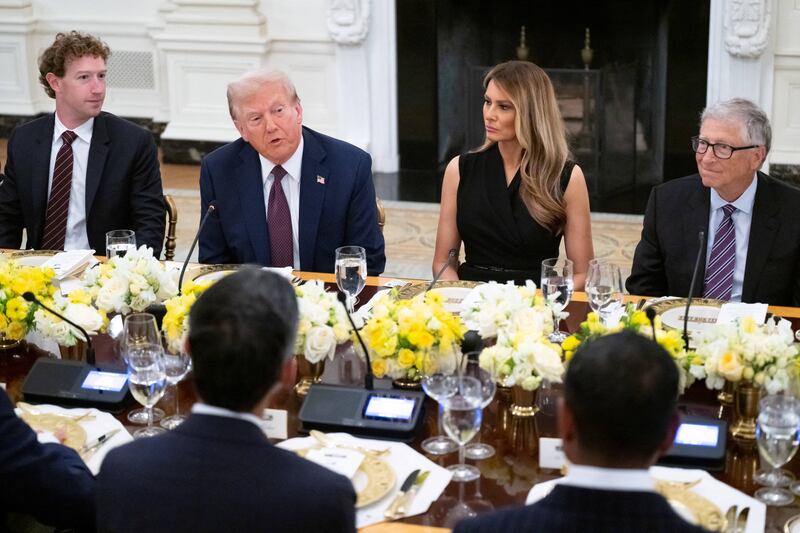 Donald Trump and First Lady Melania Trump host tech leaders, including Facebook founder Mark Zuckerberg (L) and Microsoft founder Bill Gates (R) for a dinner in the State Dining Room.