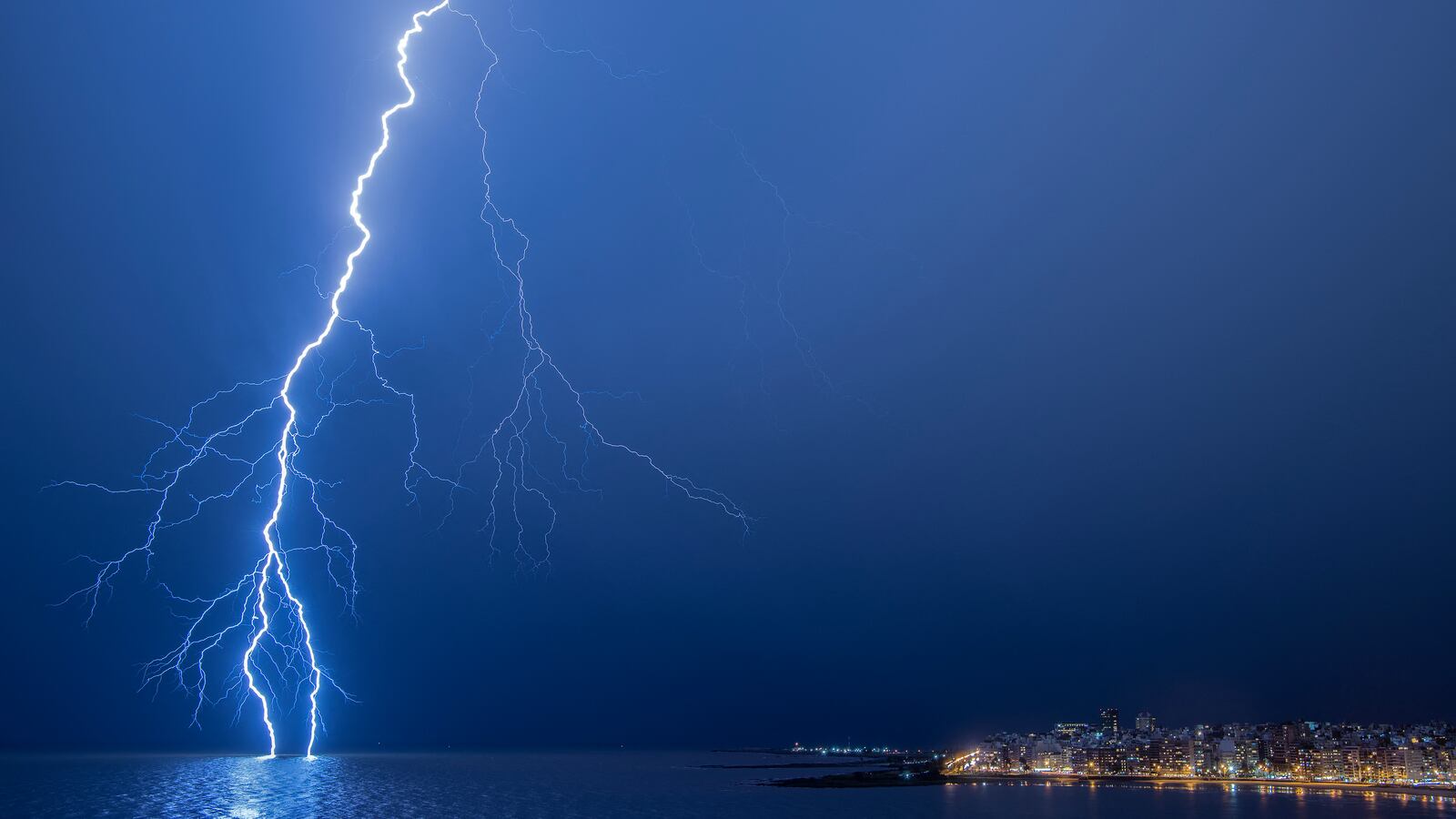 A lightning strikes during a thunderstorm in Montevideo on March 12, 2024.
