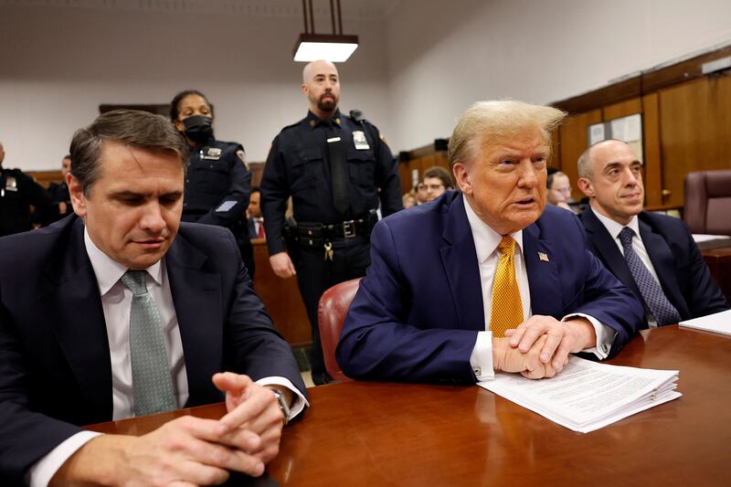 Former U.S. President Donald Trump sits in the courtroom with attorneys Todd Blanche and Emil Bove at Manhattan Criminal Court on May 14, 2024, in New York City, U.S.