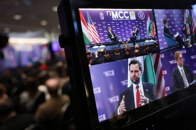 A screen displays U.S. Vice President JD Vance delivering remarks at Mathias Corvinus Collegium in Budapest, Hungary, April 8, 2026. REUTERS/Jonathan Ernst/Pool