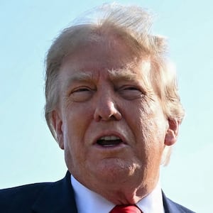 US President Donald Trump speaks to the press before he boards Air Force One for his first flight aboard the Boeing 747-8 that Qatar gifted the United States to use for executive travel, at Joint Base Andrews, in Maryland, July 1, 2026. President Trump is traveling to Medora, North Dakota to participate in the Theodore Roosevelt Presidential Library Opening Ceremony. (Photo by SAUL LOEB / AFP via Getty Images)