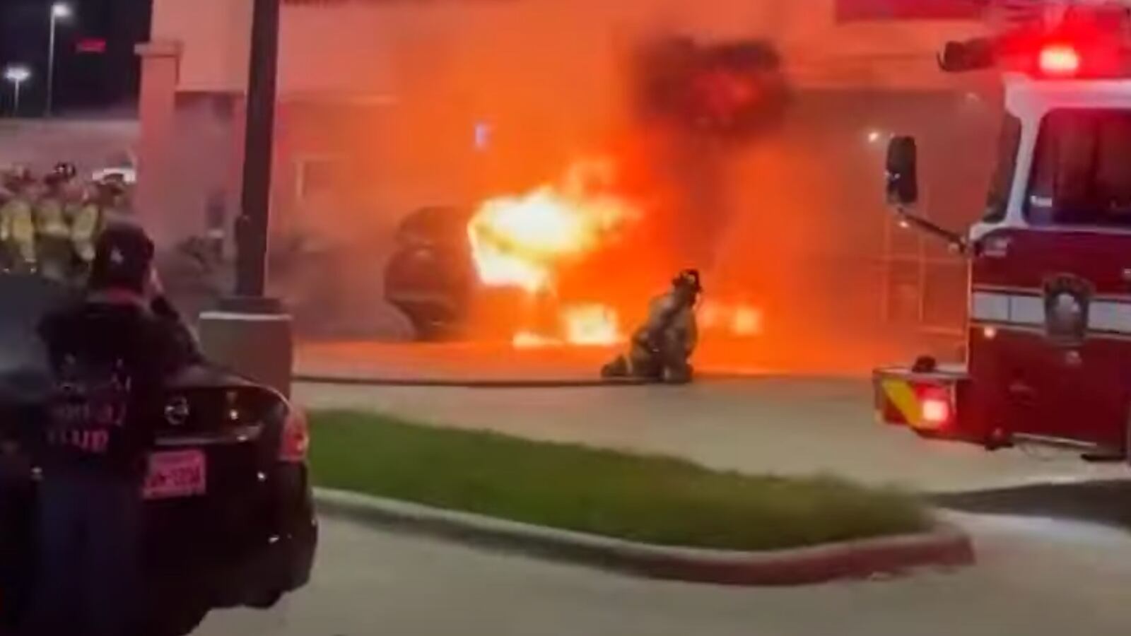 Fire after a small plane crash at a shopping center parking lot in Plano, Texas.