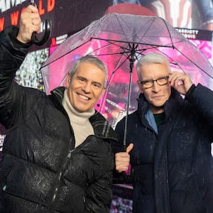 NEW YORK, NEW YORK - DECEMBER 31: Andy Cohen and Anderson Cooper host CNN's New Year's Eve coverage in the rain in Times Square on December 31, 2024 in New York City. (Photo by Craig T Fruchtman/WireImage)