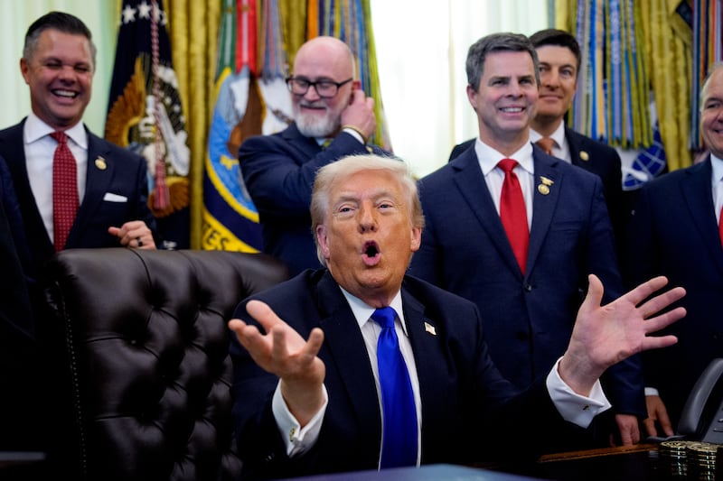 President Donald Trump answers questions in the Oval Office about Iran on April 30 as GOP congressmen look on. Polling finds 61 percent of Americans view President Donald Trump's military action against Iran as a mistake, rivaling the disapproval of the Vietnam War in the 1970s.