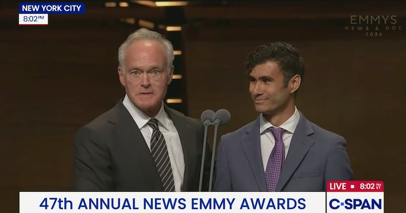 Student journalist Santiago Campos with Scott Pelley.