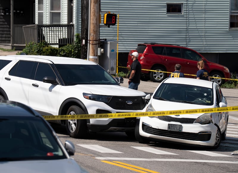 BIDDEFORD, ME - JULY 13: A Kia sedan reportedly driven by the victim of a fatal shooting can be seen with four bullet holes in the windshield at the scene on Pool Street in Biddeford on Monday, July 13, 2026. (Gregory Rec/Portland Press Herald via Getty Images)