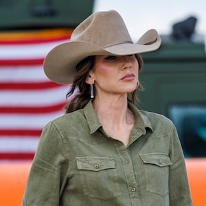 Secretary of Homeland Security Kristi Noem stands alongside U.S. Border Patrol Rio Grande Valley Sector Chief Jared Ashby, left, and U.S. Border Patrol Chief Mike Banks at a news conference on January 7, 2026 in Brownsville, Texas.
