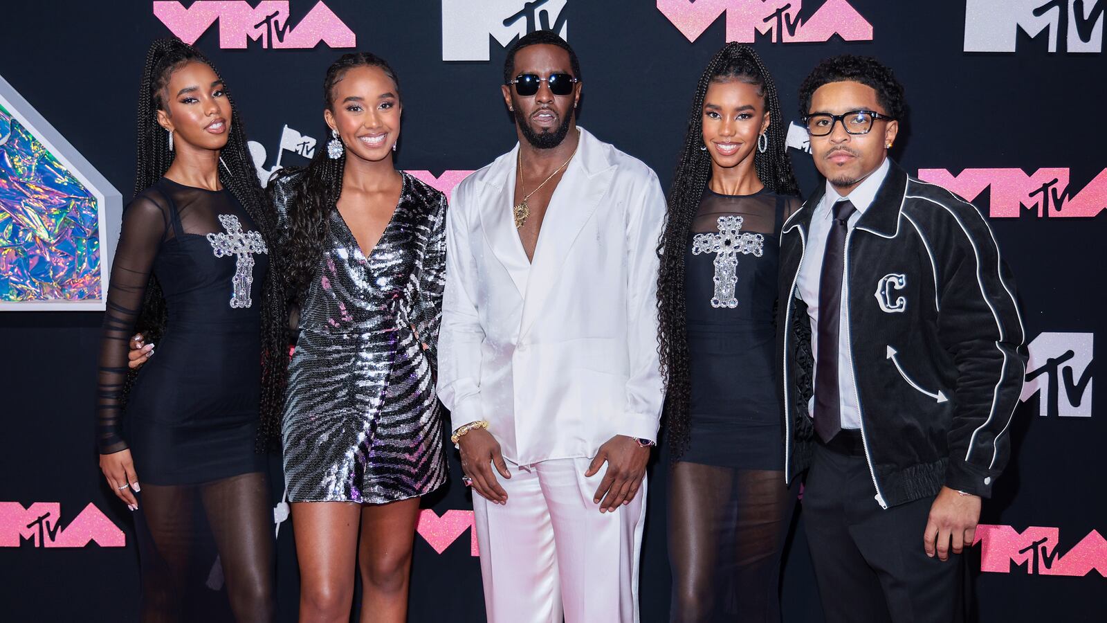 Diddy and his children on the red carpet at the MTV Video Music Awards in 2023.