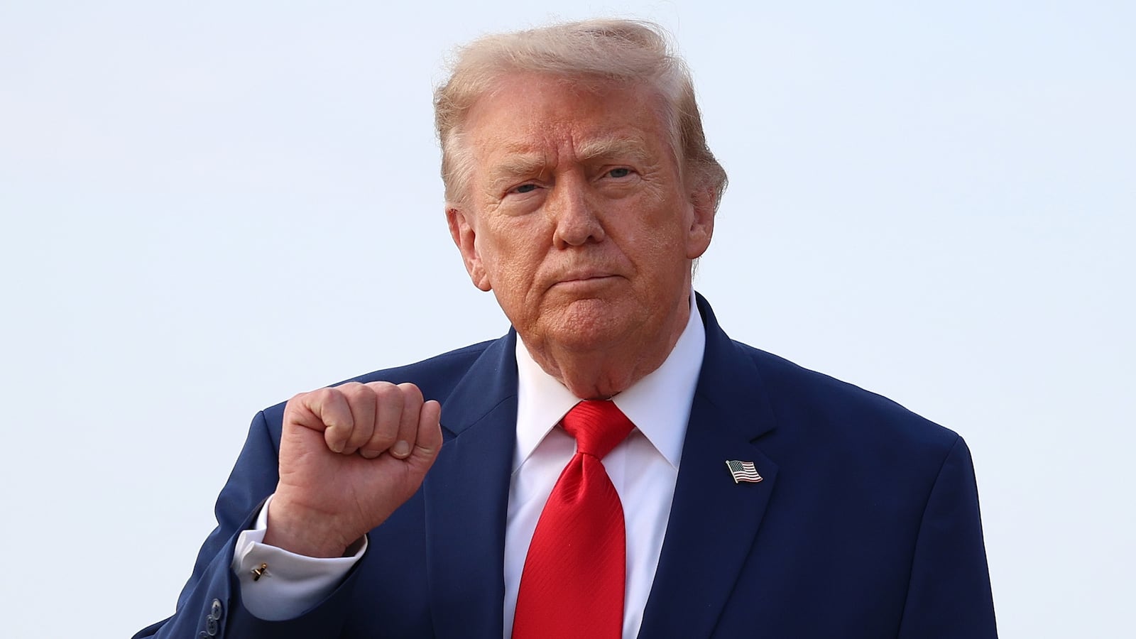 President Donald Trump motions to reporters after getting off Air Force One on July 22, 2026 at Joint Base Andrews, Maryland. Trump is returning from attending a dignified transfer at Dover Air Force Base and a rally in Georgia.