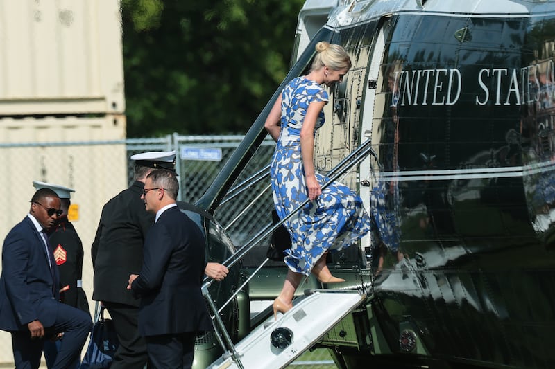 Harp boards Marine One on the Ellipse near the White House on Friday. Trump, Karoline Leavitt and Margo Martin were also on board.