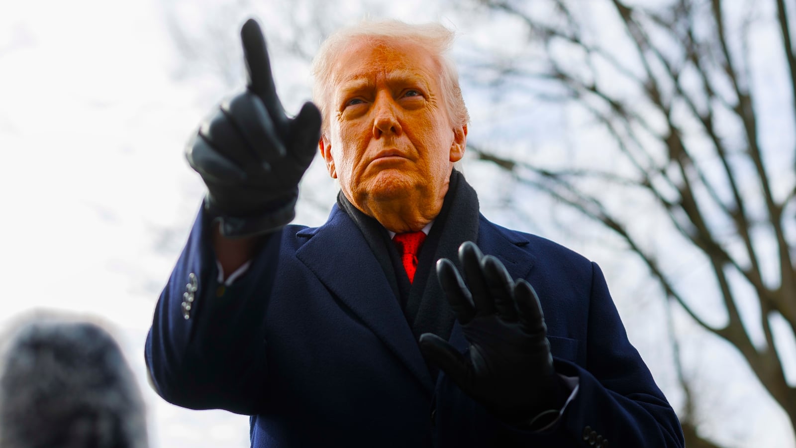 President Donald Trump speaks to reporters on the South Lawn before boarding Marine One at the White House on January 16, 2026 in Washington, DC.