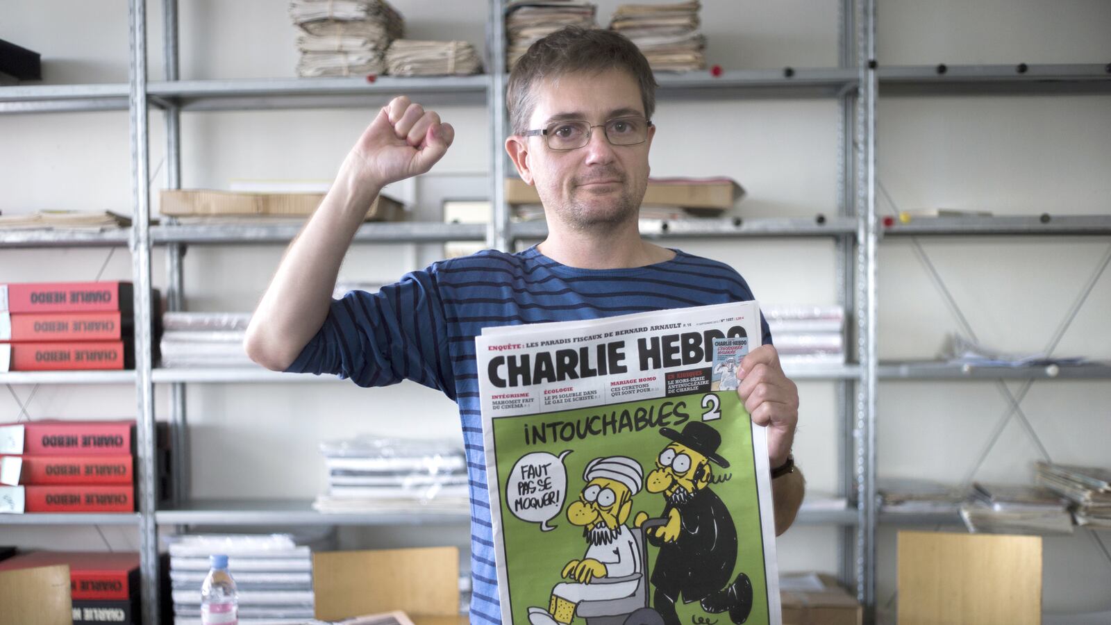 articles/2015/04/17/charlie-hebdo-editor-rips-islamophobia-from-the-grave/150417-dickey-hebdo-book-tease_eilgmu