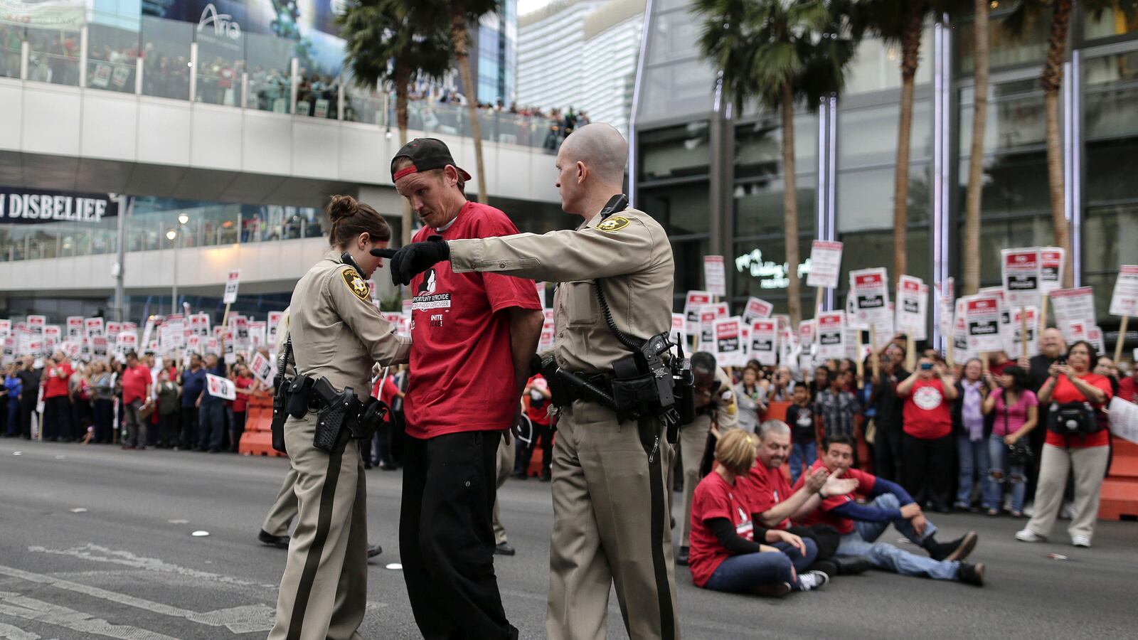cheats/2013/03/21/98-arrested-in-las-vegas-protest/130320-las-vegas-protest-cheat_rty12a