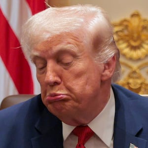 WASHINGTON, DC - MARCH 26: U.S. President Donald Trump reacts as U.S. Secretary of State Marco Rubio (L) looks on during a Cabinet meeting in the Cabinet Room of the White House on March 26, 2026 in Washington, DC. This is Trump's second Cabinet meeting of 2026 and the first since the United States and Israel began attacking Iran on February 28. (Photo by Chip Somodevilla/Getty Images)